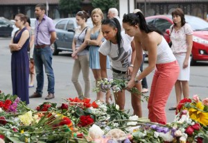 People pay tribute to the victims