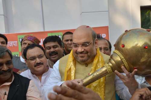 New Delhi: BJP chief Amit Shah during a press conference in New Delhi, on Oct.19, 2014. The party won Haryana Assembly Polls and has secured 123 seats in Maharashtra.