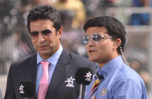 Former Indian skipper Sourav Ganguly and Wasim Akram during the 2nd Test Match between India and West Indies at Wankhede Stadium in Mumbai on Nov.14, 2013.FILE PHOTO