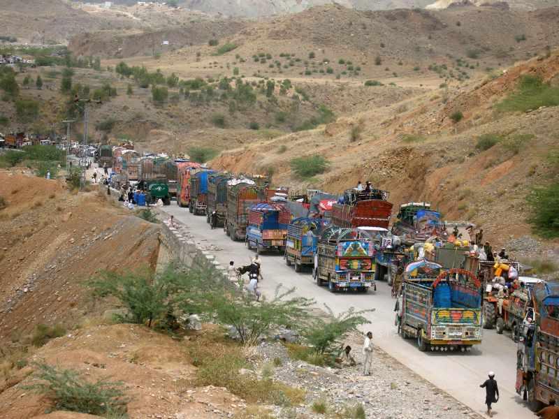  Vehicles line up at a security checkpoint as they arrive in northwest Pakistan's Bannu Civilians are streaming out of a Pakistani tribal area in a two-pronged exodus ahead of an expected ground assault against Taliban militants. 