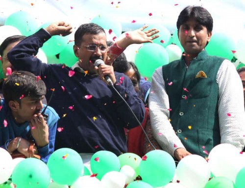  Aam Aadmi Party (AAP) leaders Arvind Kejriwal and Kumar Vishwas celebrate party's performance in the recently concluded Delhi Assembly Polls in New Delhi, on Feb 10, 2015.