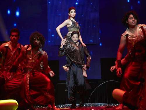 Actors Deepika Padukone and Shah Rukh Khan perform during `SLAM! - The Tour` in United States of America. Filmmaker Farah Khan, actors Malaika Arora Khan, Abhishek Bachchan, Boman Irani, Sonu Sood, Vivaan Shah and singers Kanika Kapoor and Honey Singh also performed in the programme organised at Toyota Center in Houston, and Continental Arena in New Jersey on 19th September and 20th September respectively.