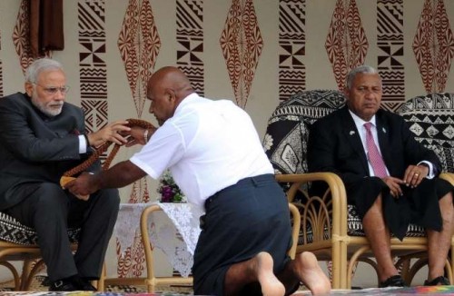 Suva: Prime Minister Narendra Modi being given traditional welcome, in Suva, Fiji on Nov 19, 2014. Also seen the Prime Minister of Fiji, Frank Bainimarama is also seen.