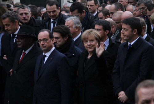 French President Francois Hollande German Chancellor Angela Merkel and Italian Prime Minister Matteo Renzi take part in a march in Paris, France, Jan. 11, 2015. A massive march commenced Sunday afternoon in Paris with the participation of French President Francois Hollande and leaders from dozens of foreign countries. More than a million French would walk in the streets of Paris in honor of the 17 victims killed during the three days deadly terrorist attack. 