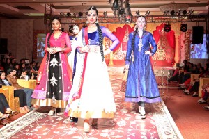 Models walk on ramp showcasing designers Kavita and Meenu's Wedding collection during a fashion show in New Delhi. (Photo: IANS)