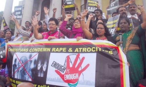 Bangalore Christian community protest condemning Rape and atrocities on women, expressing their solidarity against the Victims, demanding stringent punishment to Rapists in Bangalore on July 24, 2014. (Photo: IANS)