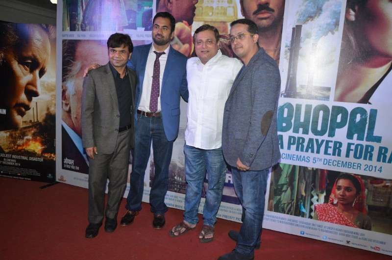 Actors Rajpal Yadav, American actor Kal Penn and Mohan Joshi during the trailer launch of film Bhopal: A Prayer for Rain in Mumbai