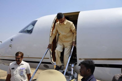 ndhra Pradesh Chief Minister N. Chandrababu Naidu arrives at Sri Sathya Sai Airport in Puttaparthi of Andhra on June 3, 2015