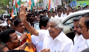 Kerala Chief Minister Oommen Chandy during an election Campaign rally supporting Congress Candidate in Coimbatore on April 19, 2014. (Photo: IANS)