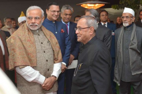 President Pranab Mukherjee and Prime Minister Narendra Modi at the inaugural ceremony of the Ceremonial Hall, at the President's Estate, in New Delhi on Dec 12, 2014. Also seen journalists Rajdeep Sardesai and Rajat Sharma. 