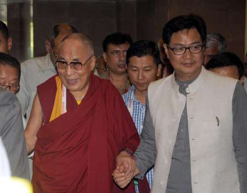 Dalai Lama the spiritual head of Tibetan Buddhists with Union MoS for Home Affairs Kiren Rijiju at the closing ceremony of a meeting of `Diverse Spiritual Traditions in India` in New Delhi