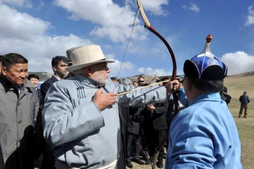 Prime Minister Narendra Modi try his hand on archery at Mini Naadam Festival, in Ulaanbaatar, Mongolia on May 17, 2015.