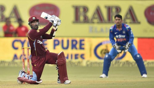 West Indian cricketer Marlon Samuels in action during the first ODI match between India and West Indies at Jawaharlal Nehru Stadium in Kochi on Oct.8, 2014.