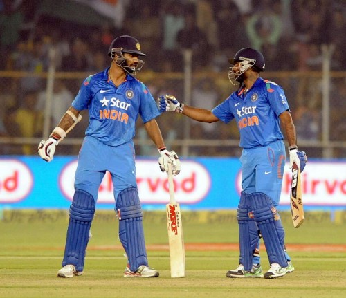 Ahmedabad: â??Indian batsmen?? Ambati Rayudu and Shikhar Dhawan during second ODI match between India and Sri Lanka at Sardar Patel Cricket Stadium in Ahmedabad, on Nov 5, 2014. 