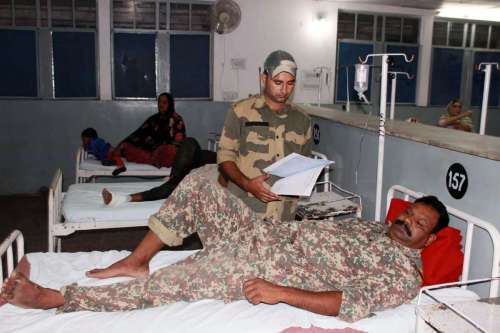 An injured BSF jawan - who got injured in cross border firing at Indo -Pak border in RS Pora sector of Jammu - being treated at a Jammu hospital.Twenty people were injured in overnight Pakistani firing at the border in Jammu and Kashmir. 