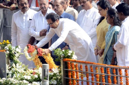 Mumbai: Shiv Sena chief Uddhav Thackeray pays tribute to Shiv Sena founder Bal Thackeray on his death anniversary in Mumbai, on Nov 17, 2014. 