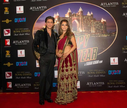 Mumbai: Actor Shah Rukh Khan along with his wife Gauri Khan during the World premiere of film Happy New year in Dubai. (Photo: IANS)