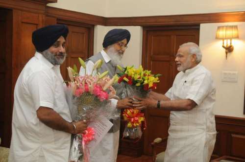 Punjab Chief Minister Parkash Singh Badal and state's Deputy Chief Minister Sukhbir Singh Badal call on Prime Minister Narendra Modi in New Delhi