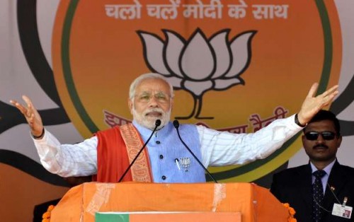 Hazaribagh: Prime Minister Narendra Modi addresses during an election rally ahead of third phase of Jharkhand assembly elections at Hazaribagh, Jharkhand on Dec. 6, 2014. (Photo: IANS)