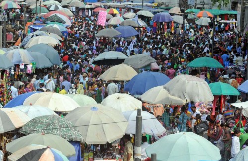 Ahmedabad: People throng a marketplace for Diwali shopping in Ahmedabad, on Oct.19, 2014. (Photo: IANS)