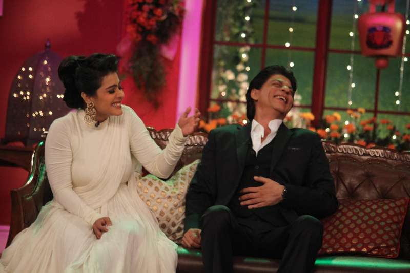 The evergreen couple Kajol and Shahrukh Khan on the sets of Comedy Nights With Kapil reliving the good old days at Dilwale Dulhania Le Jayenge 1000 weeks completion special episode shoot on Comedy Nights With Kapil in Mumbai. They are appearing together again in Dilwale