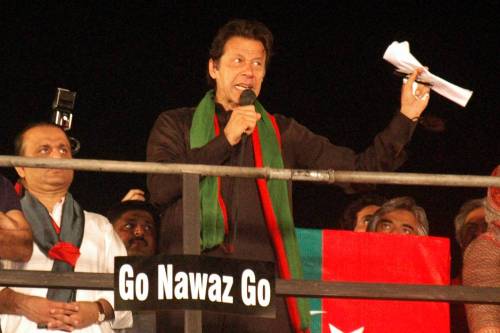 Pakistani opposition leader Imran Khan addresses his supporters at an anti-government protest in eastern Pakistan's Lahore on Sept. 28, 2014. Supporters of Pakistan's two opposition leaders, Imran Khan of Pakistan Tehrik-e-Insaf and Tahir ul Qadri of Pakistan Wami Tehrik attended the sit-in protest in Islamabad, demanding resignation of Prime Minister Nawaz Sharif and fresh polls.