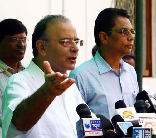 Union Minister for Finance, Corporate Affairs and Defence Arun Jaitley briefs press regarding tensions prevailing at Indo-Pak border in Jammu and Kashmir in New Delhi, on Oct.9, 2014. Also seen DG (Media & Communication), MoD, Shri Sitanshu Kar. Seven civilians have been killed so far in Pakistani firing in civilian areas close to the border since Oct 6. A total of 60 people have been injured, including five who were injured Wednesday night. (Photo: IANS/PIB)