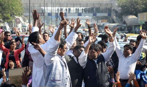  Catholics stage a protest outside the Delhi Police headquarters to demand a judicial probe, a day after a church was gutted in New Delhi on Dec 2, 2014. A Catholic church in east Delhi's Dilshad Garden area was gutted under mysterious circumstances on Monday (1st December). 