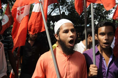 Social activists demonstrate demanding death sentence of Bangladesh Jamaat-e-Islmai party's Jamaat central executive committee member Mir Quasem Ali during the announcement of verdict at the war crimes court in Dhaka, Bangladesh. Another leader of Bangladesh's largest Islamist party was sentenced to death in capital Dhaka on Sunday for war crimes including mass killings. 