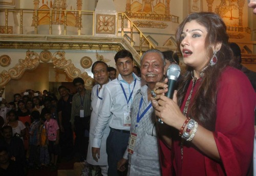 Actress Raveena Tandon during inauguration of a Durga Puja pandal in Kolkata, on Sept. 29, 2014. (Photo: IANS)