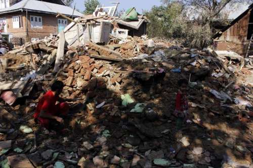 Debris of houses destroyed in the recent Jammu and Kashmir floods in Pampore of Jammu and Kashmir's Pulwama district. 