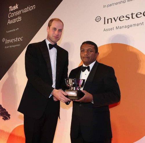  Prince William, Duke of Cambridge presents the Tusk Award for Conservation in Africa to Herizo Andrianandrasana at the Tusk Conservation Awards 2014 at Claridge's Hotel on November 25, 2014 in London, England. This is the second year of the Awards which celebrate the unsung heros of Conservation. 