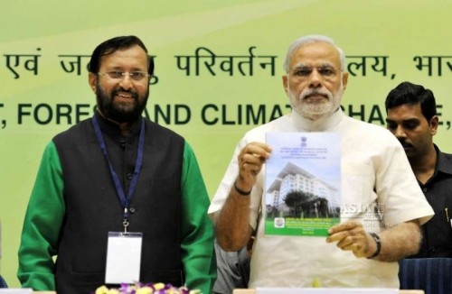 Prime Minister Narendra Modi with the Union Minister of State for Environment, Forest and Climate Change (Independent Charge) Prakash Javadekar addresses at the Conference of State Environment and Forest Ministers in New Delhi on April 6, 2015.