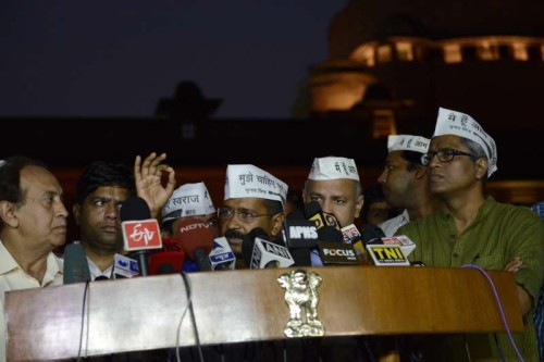 Aam Admi Party leaders Arvind Kejriwal, Manish Sisodia, Ashutosh and other leaders addressing the media after meeting the President Pranab Mukherjee in New Delhi 