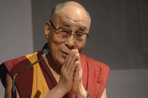 Dalai Lama the spiritual head of Tibetan Buddhists during 108th Foundation Day of Indian Merchants' Chamber at Y B Chavan Auditorium in Mumbai, on Sept. 18, 2014. (Photo: Sandeep Mahankal/IANS)