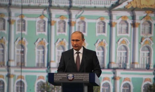 Russian President Vladimir Putin addresses a plenary session of the 19th St. Petersburg International Economic Forum in St. Petersburg, Russia, on June 19, 2015.