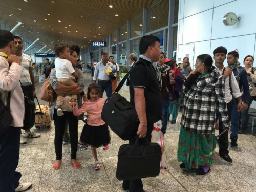 Nepalese passengers wait for flights back to Nepal at Kuala Lumpur International Airport in Kuala Lumpur, capital of Malaysia, on April 26, 2015. A total of 2,152 people have been killed and about 5,000 others inured in a powerful earthquake that struck Nepal at midday Saturday, National police spokesman Kamal Singh Bam said