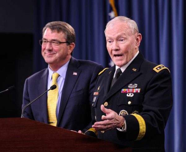 Chairman of the U.S. Joint Chiefs of Staff General Martin E. Dempsey (R) speaks during a press conference at Pentagon in Washington D.C., capital of the United States, July 1, 2015. The Pentagon on Wednesday warned of possible attacks by supporters of the Islamic State (IS), the extremist group, in the United States over the federal holiday of Independence Day which coincides on Saturday.