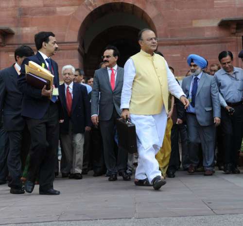 Union Minister for Finance, Corporate Affairs and Defence Arun Jaitley leaves for the Parliament from North Block to present General Budget 2014-15 in New Delhi on July 10, 2014. (Photo: IANS)