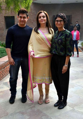 Agra: Actor Aamir Khan (L), with his wife and filmmaker Kiran Rao (R), and Reliance Foundation Chairperson Nita Ambani (C) during their visit to Agra on Nov 9, 2014. (Photo: Pawan Sharma/IANS)