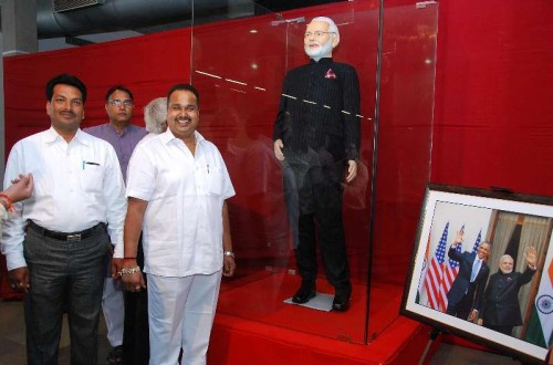 Prime Minister Narendra Modi's `name-striped` suit on display at a charity auction organised in Surat, Gujarat on Feb 18, 2015. 