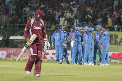 Dharmasala: West Indian players Denesh Ramdin walks back to the pavilion after getting dismissed during the fourth ODI match between India and West Indies at Himachal Pradesh Cricket Association Stadium, Dharmasala 