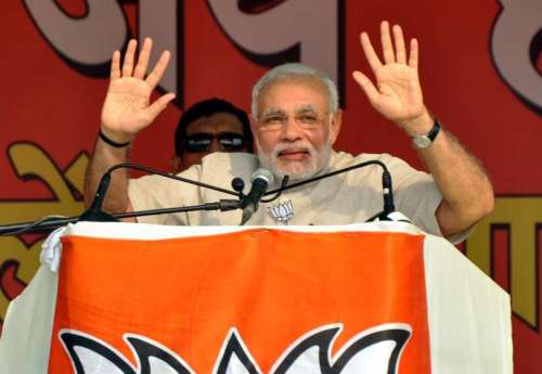 Prime Minister Narender Modi addressing during Vijay Haryana Rally in Faridabad on Oct. 6, 2014. (Photo: IANS)