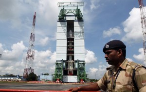 pslv rocket Paramilitary soldiers guard the Polar Satellite Launch Vehicle (PSLV-C25) at Satish Dhawan Space Center at Andhra Pradesh's Sriharikota on Oct.30, 2013. Indiaâ??s Mars orbiter mission is scheduled to be launched by the Polar Satellite Launch Vehicle (PSLV-C25) on Nov. 5. (Photo: IANS)