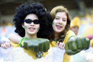 Supporters of Brazil pose before a Round of 16 match between Brazil and Chile of 2014 FIFA World Cup at the Estadio Mineirao Stadium in Belo Horizonte, Brazil