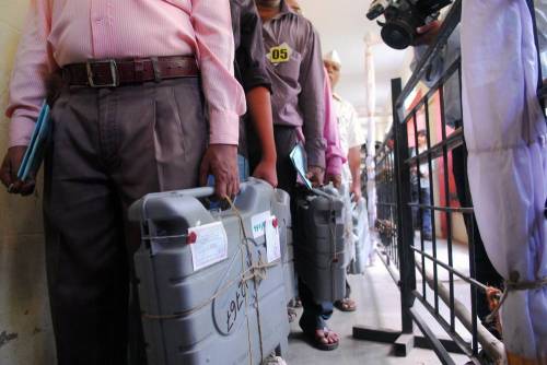 Electronic Voting Machines (EVMs) being taken for counting at a counting centre in Mumbai on May 16, 2014. (Photo: IANS)