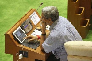 Goa Chief Minister Manohar operates a tab on the first day of Goa Assembly session which is now 95 % paperless at Goa Assembly Complex in Porvorim, Goa on July 22, 2014. (Photo: IANS)