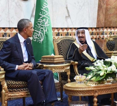 U.S. President Barack Obama talks with Saudi Arabia's King Salman bin Abdulaziz Al Saud(R) after arriving in Riyadh, Saudi Arabia, on Jan. 27, 2015. Obama cut short his visit to India to be able to visit Saudi Arabia to offer his condolences and discuss key regional and international topics.