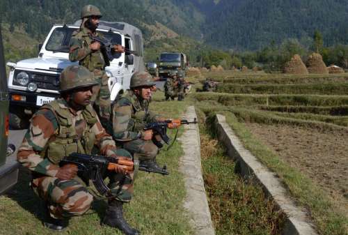 Soldiers in action during an encounter in Kupwara of Jammu and Kashmir . One alleged militant was killed in the encounter.