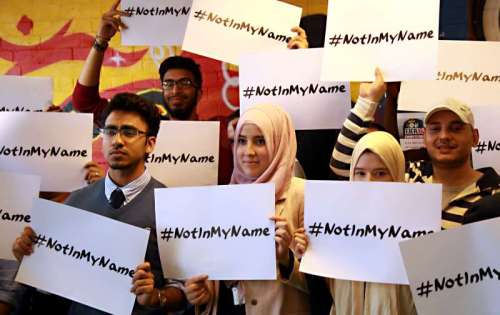 Young British Muslims have come together to launch a social media campaign against ISIS using #notinmyname to register their revulsion and the rejection of terrorist groups actions which claim are in the name of Islam some of its supporters has been led by East London based charity Active Change Foundation in Leytonstone. Hanif Qadir founder of the Foundation speaks to young British Muslims at the youth centre. Press Association photo Tuesday September 16th 2014 picture Sean Dempsey/PA